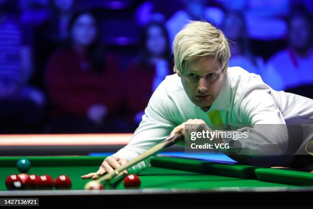 Neil Robertson of Australia plays a shot in the group match between Mark Selby of England and Rebecca Kenna of England vs Neil Robertson of Australia...