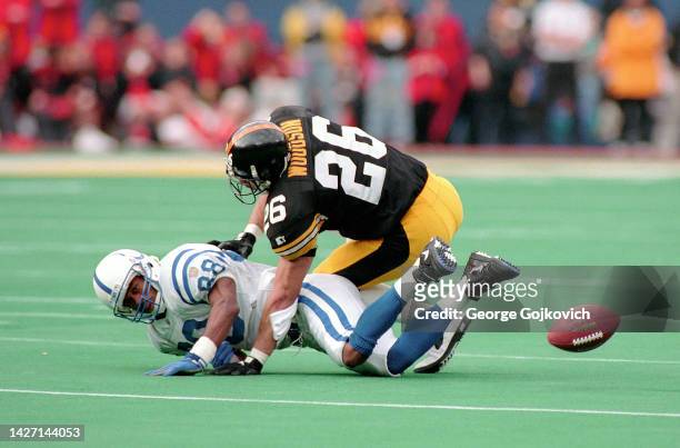 Cornerback Rod Woodson of the Pittsburgh Steelers breaks up a pass intended for wide receiver Marvin Harrison of the Indianapolis Colts during a...