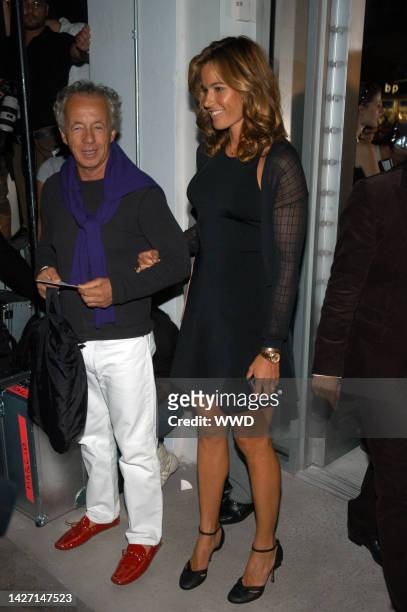Gilles Bensimon and Kelly Bensimon attend Narciso Rodriguez\'s spring 2006 runway show at Exit Art.