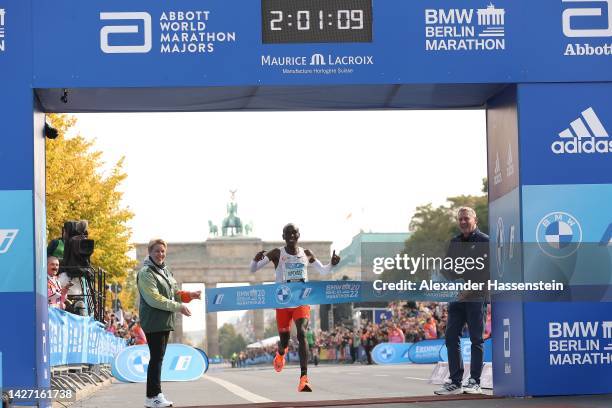 Eliud Kipchoge of Kenya crosses the finish line of the 2022 BMW Berlin-Marathon in a new Wolrd Record Time of 2:01:09 h on September 25, 2022 in...