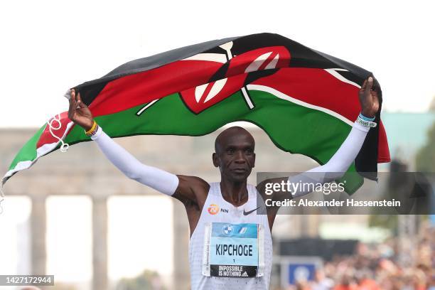 Eliud Kipchoge of Kenya celebrates winning the 2022 BMW Berlin-Marathon in a new Word Record Time of 2:01:09 h on September 25, 2022 in Berlin,...