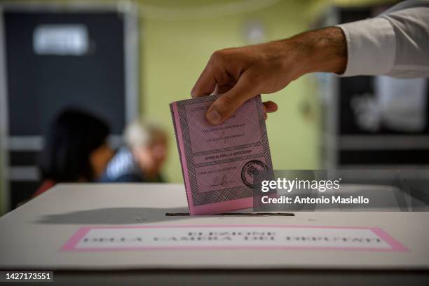 Man casts his vote for Italian general election at a polling station on September 25, 2022 in Rome, Italy. The snap election was triggered by the...