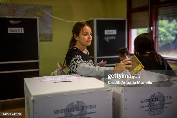 Woman casts her vote for Italian general election at a polling station , on September 25, 2022 in Rome, Italy. The snap election was triggered by the...