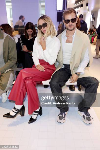 Candela Pelizza and Paolo Stella are seen on the front row of the Benetton Fashion Show during the Milan Fashion Week Womenswear Spring/Summer 2023...