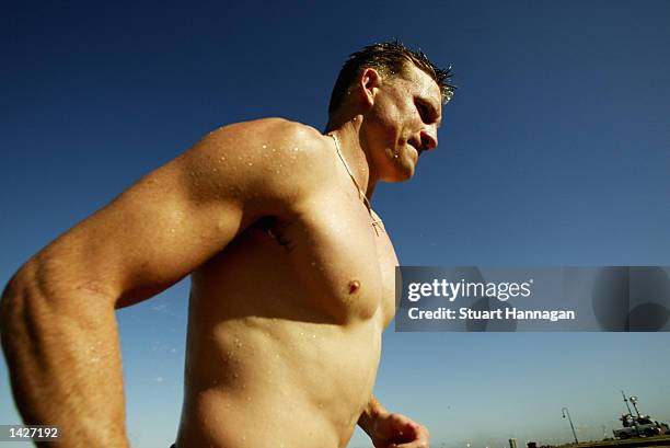 Nathan Buckley the Captain of Collingwood leaves the water after the Collingwood Magpies training session at St Kilda Beach, Melbourne, Australia ,...