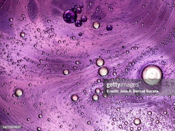 full frame of metallic texture thick liquid drops and bubbles. - eukaryote stock pictures, royalty-free photos & images