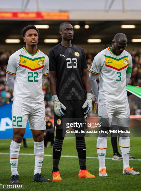 Abdou Diallo, Alfred Gomis, Kalidou Koulibaly of Senegal look on as the national anthems are played during the international friendly match between...