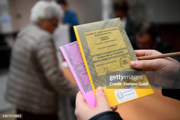 General view shows the ballot to vote in the Italian general election as Italians vote to elect a new parliament on September 25, 2022 in Turin,...