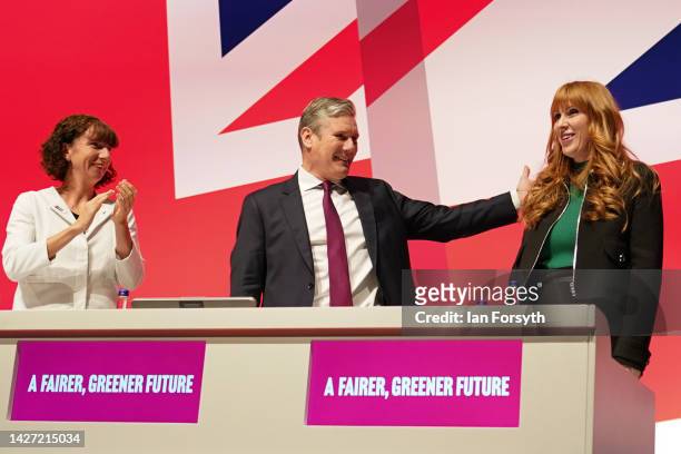 Labour leader Sir Keir Starmer congratulates deputy leader Angela Rayner after she delivers the Deputy Leaders Report to delegates during the Labour...