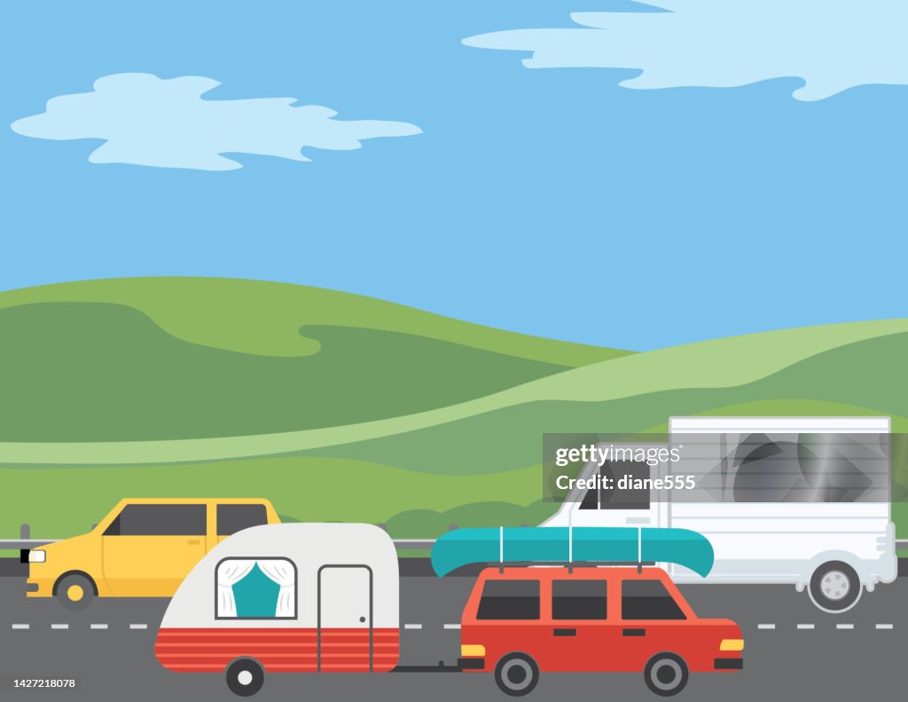 People Travelling On A Road Trip On A Busy Highway