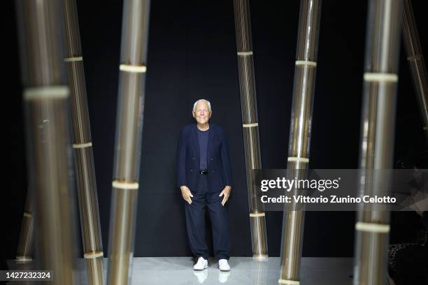 Fashion designer Giorgio Armani acknowledges the applause of the audience at the Giorgio Armani Fashion Show during the Milan Fashion Week Womenswear...