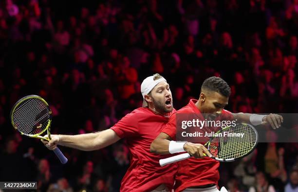 Jack Sock and Felix Auger-Aliassime of Team World celebrate match point during the match between Matteo Berrettini and Andy Murray of Team Europe and...