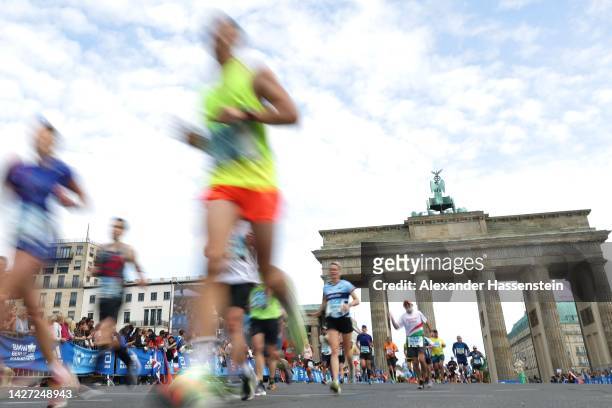General view as runners competes at the Brandenburger Tor during the 2022 BMW Berlin-Marathon on September 25, 2022 in Berlin, Germany.