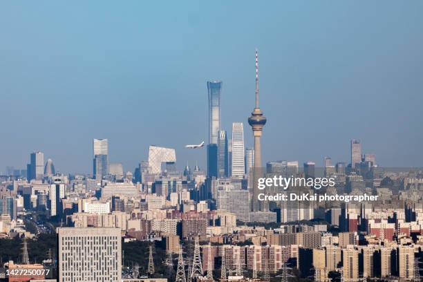 beijing  skyline sunset - beijing cctv tower stock pictures, royalty-free photos & images