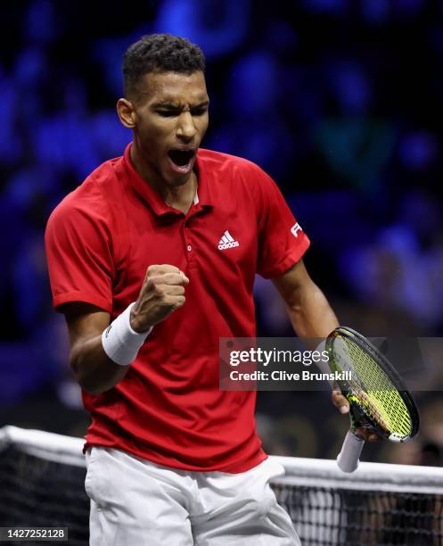 Felix Auger-Aliassime of Team World celebrates a point during the singles match between Felix Auger-Aliassime of Team World and Novak Djokovic of...