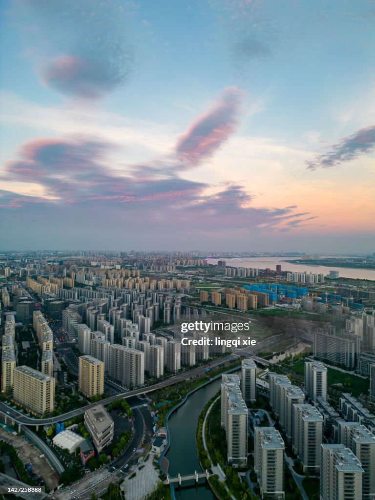 Cityscape of Hangzhou, China under the sunset from the perspective of drone