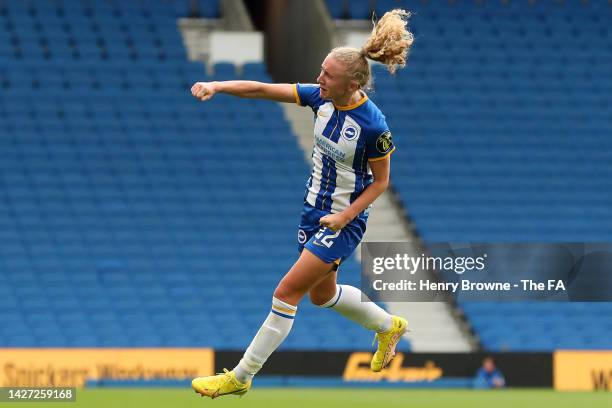 Katie Robinson of Brighton & Hove Albion celebrates after scoring their side's second goal during the FA Women's Super League match between Brighton...