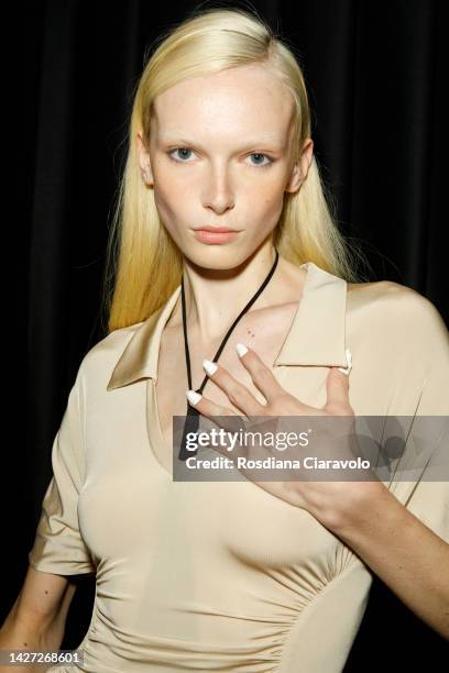 Model poses backstage at the Trussardi Fashion Show during the Milan Fashion Week Womenswear Spring/Summer 2023 on September 24, 2022 in Milan, Italy.