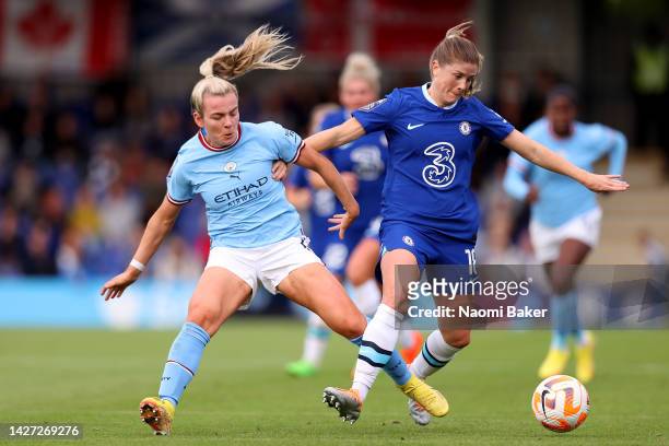 Lauren Hemp of Manchester City challenges Maren Mjelde of Chelsea during the FA Women's Super League match between Chelsea and Manchester City at...