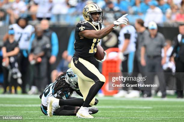 Michael Thomas of the New Orleans Saints reacts after making a catch for a first down against the Carolina Panthers during the first quarter at Bank...