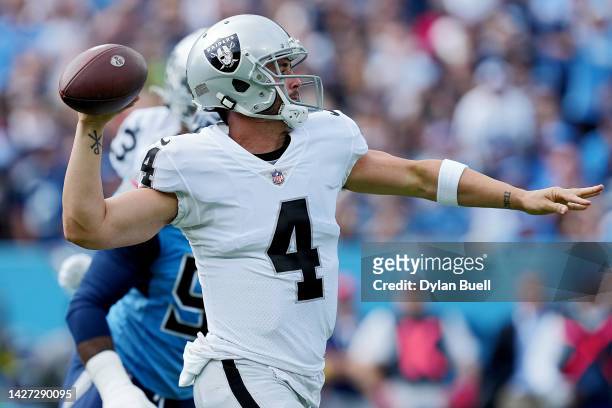 Quarterback Derek Carr of the Las Vegas Raiders passes the ball in the first quarter of the game against the Tennessee Titans at Nissan Stadium on...