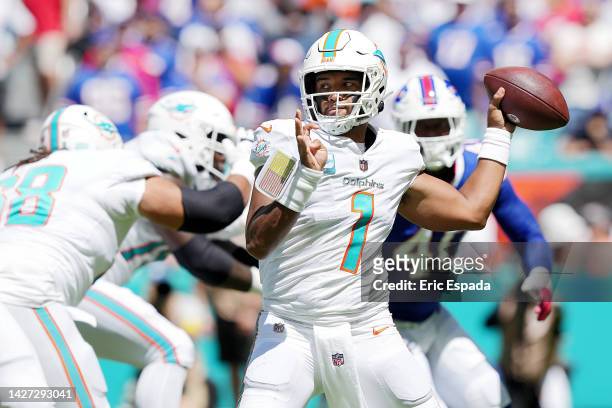 Quarterback Tua Tagovailoa of the Miami Dolphins passes the ball during the first half of the game against the Buffalo Bills at Hard Rock Stadium on...
