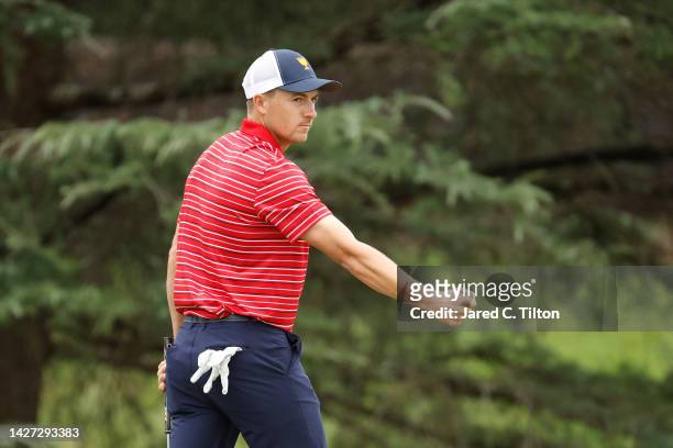 Jordan Spieth of the United States Team reacts after making a long putt on the seventh green during Sunday singles matches on day four of the 2022...