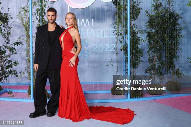 Nicolas Furtado and Ester Exposito attends the CNMI Sustainable Fashion Awards 2022 pink carpet during the Milan Fashion Week Womenswear...