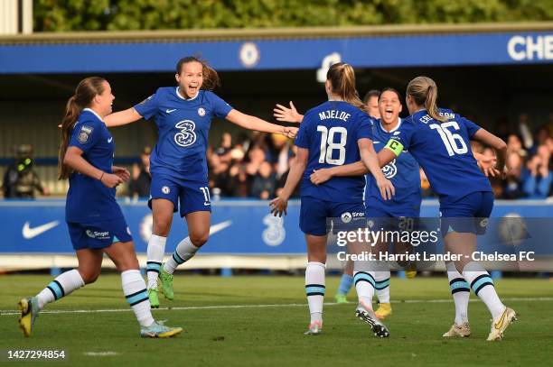 Maren Mjelde of Chelsea celebrates with teammates Fran Kirby, Guro Reiten, Sam Kerr and Magdalena Eriksson after scoring her team's second goal...