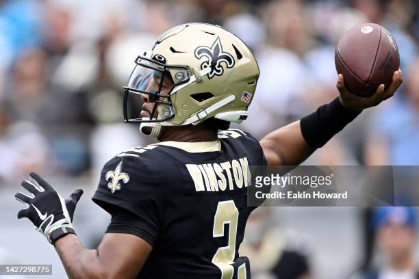 Jameis Winston of the New Orleans Saints passes the ball against the Carolina Panthers during the first quarter at Bank of America Stadium on...