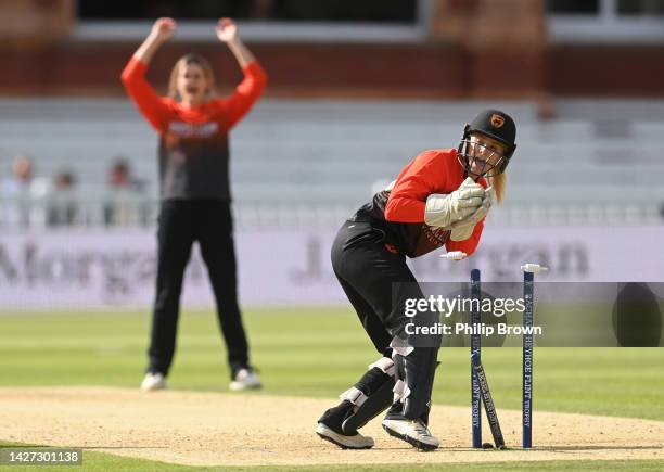 Chloe Hill of Southern Vipers breaks the stumps and runs out Lauren Winfield-Hill during the Rachael Heyhoe-Flint Trophy Final between Northern...