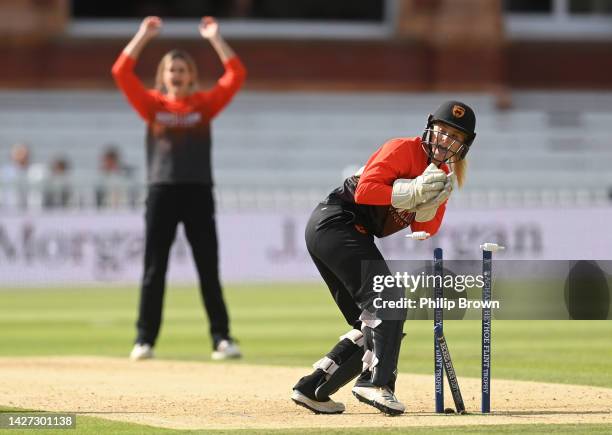 Chloe Hill of Southern Vipers breaks the stumps and runs out Lauren Winfield-Hill during the Rachael Heyhoe-Flint Trophy Final between Northern...