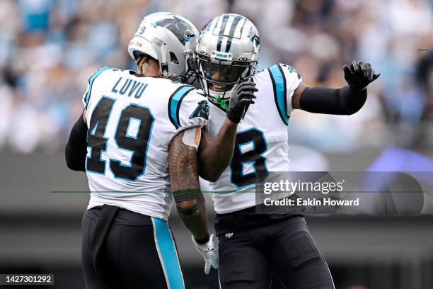 Frankie Luvu and Jaycee Horn of the Carolina Panthers react after blocking a field goal attempt by the New Orleans Saints during the second quarter...