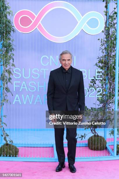 Carlo Capasa attends the CNMI Sustainable Fashion Awards 2022 pink carpet during the Milan Fashion Week Womenswear Spring/Summer 2023 on September...