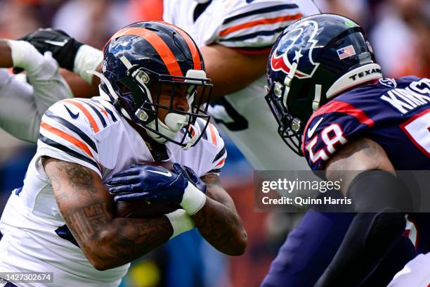 Trestan Ebner of the Chicago Bears runs in the second quarter against Christian Kirksey of the Houston Texans at Soldier Field on September 25, 2022...