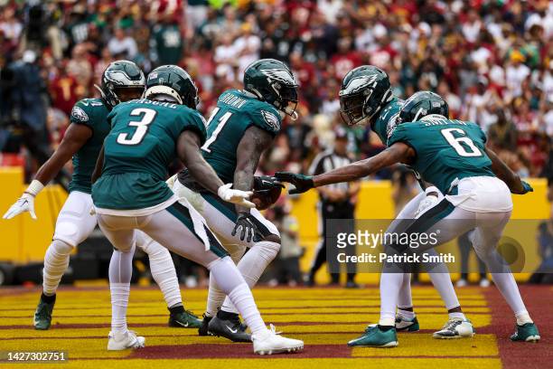 Wide receiver A.J. Brown of the Philadelphia Eagles celebrates with teammates after his touchdown during the second quarter against the Washington...