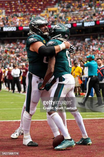 Center Jason Kelce of the Philadelphia Eagles hugs wide receiver DeVonta Smith of the Philadelphia Eagles after Smith's touchdown during the second...