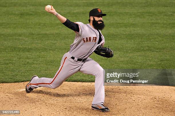 Brian Wilson of the San Francisco Giants pitches in relief against the Colorado Rockies at Coors Field on April 11, 2012 in Denver, Colorado. The...