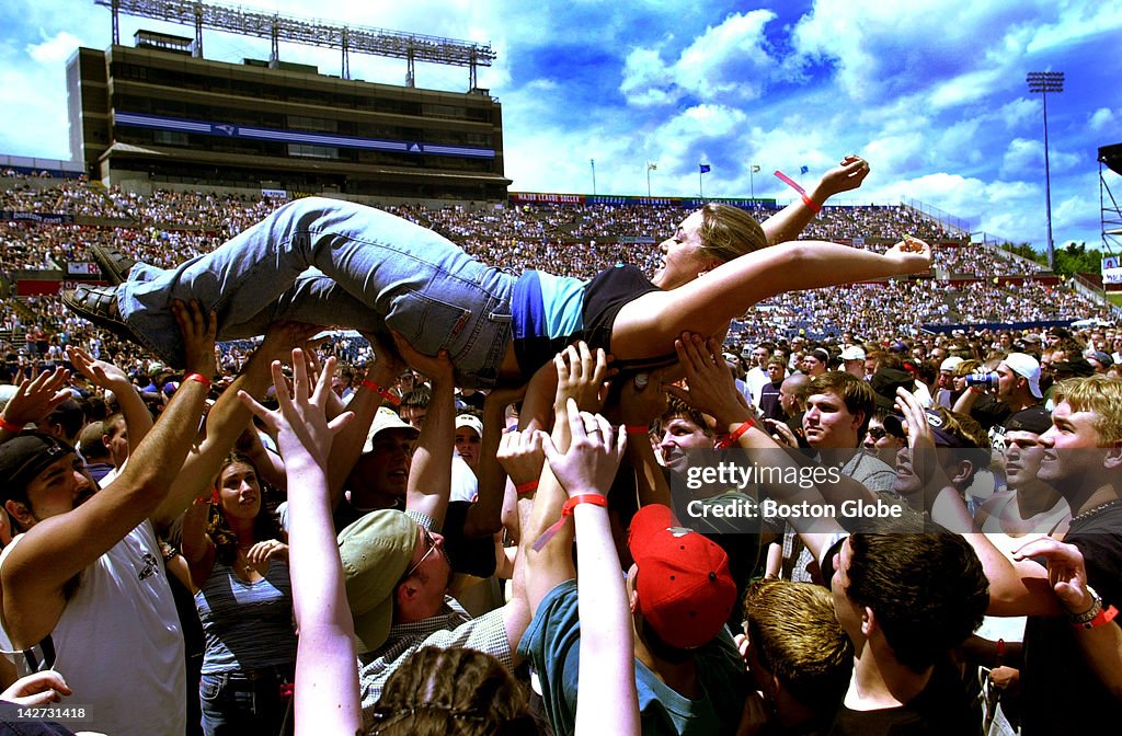 Jamie Chipman of Bridgewater, Mass., body surfs in front of the... News ...
