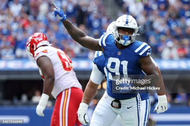 Yannick Ngakoue of the Indianapolis Colts celebrates after sacking Patrick Mahomes of the Kansas City Chiefs during the first half at Lucas Oil...