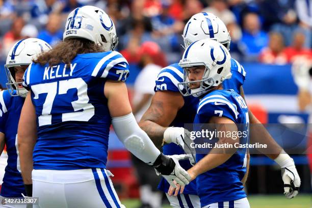 Chase McLaughlin of the Indianapolis Colts is congratulated by Dennis Kelly after making a field goal against the Kansas City Chiefs during the...