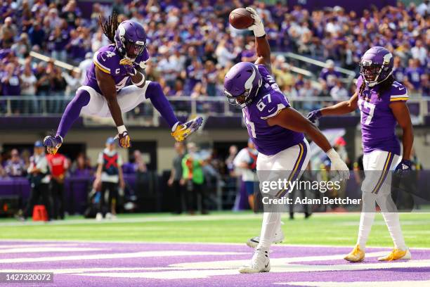 Guard Ed Ingram of the Minnesota Vikings celebrates a touchdown as running back Dalvin Cook of the Minnesota Vikings looks on in the second quarter...