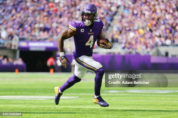 Running back Dalvin Cook of the Minnesota Vikings runs the ball in for a touchdown in the second quarter of the game against the Detroit Lionsat U.S....