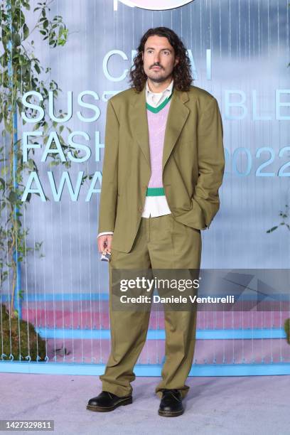 Guest attends the CNMI Sustainable Fashion Awards 2022 pink carpet during the Milan Fashion Week Womenswear Spring/Summer 2023 on September 25, 2022...