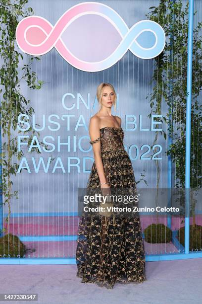 Guest attends the CNMI Sustainable Fashion Awards 2022 pink carpet during the Milan Fashion Week Womenswear Spring/Summer 2023 on September 25, 2022...