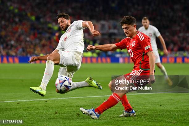Daniel James of Wales passes while under pressure from Bartosz Bereszynski of Poland during the UEFA Nations League League A Group 4 match between...