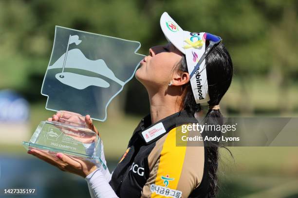 Atthaya Thitikul of Thailand kisses the winner's trophy after winning the Walmart NW Arkansas Championship Presented by P&G at Pinnacle Country Club...