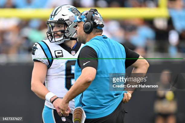 Baker Mayfield and head coach Matt Rhule of the Carolina Panthers talk during the second half of the game against the New Orleans Saints at Bank of...