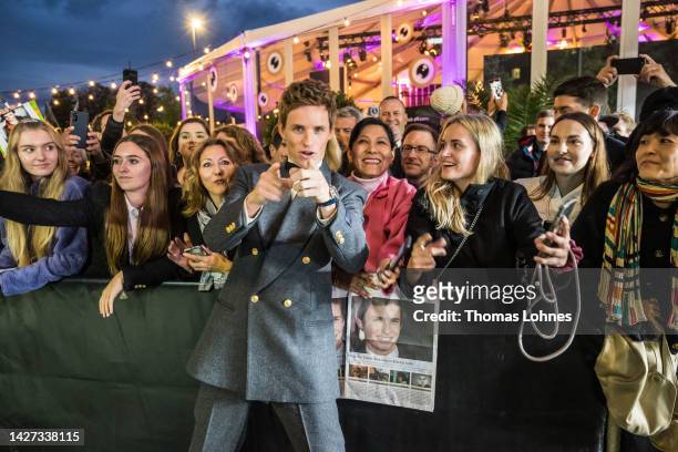 Eddie Redmayne engages with fans at the premiere of "The Good Nurse" during the 18th Zurich Film Festival at Kongresshaus on September 25, 2022 in...