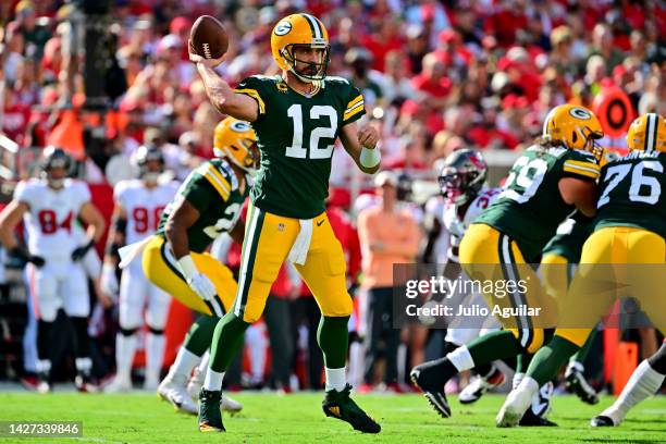 Aaron Rodgers of the Green Bay Packers throws a pass against the Tampa Bay Buccaneers during the first quarter in the game at Raymond James Stadium...
